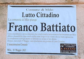A general view of he funeral poster of the Italian musician Franco Battiato in  Milo (Catania), Italy, 19 May 2021. According to various media quoting his family, Battiato has passed away at his residence in Milo yesterday aged 76.  His funeral takes place todayANSA/ ORIETTA SCARDINO