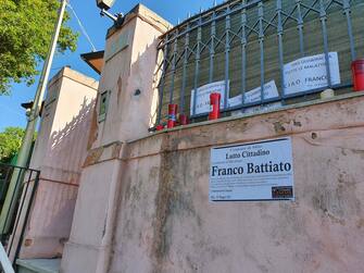 A general view of he funeral poster of the Italian musician Franco Battiato in  Milo (Catania), Italy, 19 May 2021. According to various media quoting his family, Battiato has passed away at his residence in Milo yesterday aged 76.  His funeral takes place todayANSA/ ORIETTA SCARDINO
