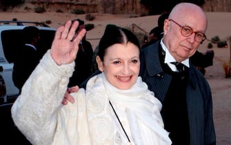 epa09231021 (FILE) - Italian Artist Carla Fracci Etoile (L) of the Teatro alla Scala in Milan arrives for a tribute charity concert and memorial ceremony for late Italian tenor Luciano Pavarotti at the archaeological site of Petra, Jordan, 12 October 2008 (reissued 27 May 2021). According to Milan's La Scala theatre,  Carla Fracci has died aged 84 on 27 May 2021.  EPA/JAMAL NASRALLAH