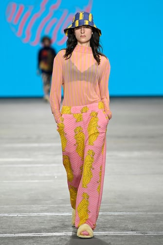 SYDNEY, AUSTRALIA - JUNE 01: A model walks the runway in a design by Outfaced during the Next Gen show during Afterpay Australian Fashion Week 2021 Resort '22 Collections at Carriageworks on June 01, 2021 in Sydney, Australia. (Photo by Stefan Gosatti/Getty Images)