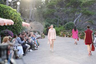 ISCHIA, ITALY - JUNE 29: Models walk the runway at the Max Mara Resort 2022 Collection Show on June 29, 2021 in Ischia, Italy. (Photo by Vittorio Zunino Celotto/Getty Images)