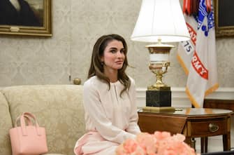 Rania Al-Abdullah, Queen of Jordan, sits during a meeting with U.S. President Donald Trump and King Abdullah II of Jordan, not pictured, in the Oval Office of the White House in Washington, D.C., U.S., on Monday, June 25, 2018. President Trump and King Abdullah are expected to discuss Iran, Syria, Israel and the Palestinians. Photographer: Olivier Douliery/Pool via Bloomberg