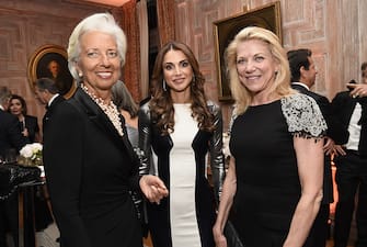 Christine Lagarde, managing director of the International Monetary Fund (IMF), from left, Queen Rania Al-Abdullah of Jordan, and Lynn Forester de Rothschild, founder and chief executive officer of ELR Holdings Ltd., attend the Bloomberg Vanity Fair White House Correspondents' Association (WHCA) dinner afterparty in Washington, D.C., U.S., on Saturday, April 30, 2016. The 102nd WHCA raises money for scholarships and honors the recipients of the organization's journalism awards. Photographer: David Paul Morris/Bloomberg via Getty Images  