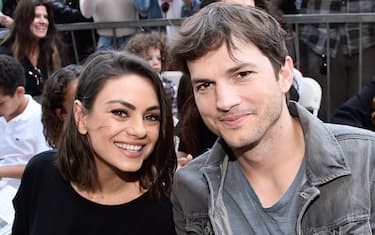 HOLLYWOOD, CA - MAY 03:  Actors Mila Kunis (L) and Ashton Kutcher at the Zoe Saldana Walk Of Fame Star Ceremony on May 3, 2018 in Hollywood, California.  (Photo by Alberto E. Rodriguez/Getty Images for Disney)