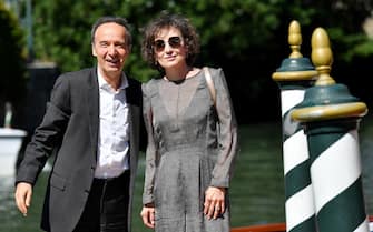 Italian actor and director Roberto Benigni with his wife Nicoletta Braschi (R)arrive at the Lido Beach for the 78th annual Venice International Film Festival, in Venice, Italy, 01 September 2021. The festival runs from 01 to 11 September 2021.  ANSA/ETTORE FERRARI