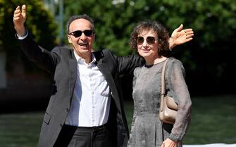 Italian actor and film director Roberto Benigni with his wife Nicoletta Braschi (R)arrive at the Lido Beach for the 78th annual Venice International Film Festival, in Venice, Italy, 01 September 2021. The festival runs from 01 to 11 September 2021.  ANSA/ETTORE FERRARI