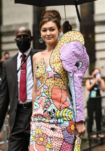 NEW YORK, NEW YORK - SEPTEMBER 09: Gigi Hadid is seen wearing a Moschino dress outside the Moschino show during New York Fashion Week S/S 22 on September 09, 2021 in New York City. (Photo by Daniel Zuchnik/Getty Images)