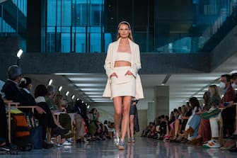 MILAN, ITALY - SEPTEMBER 23: A model walks the runway at the Max Mara fashion show during the Milan Fashion Week - Spring / Summer 2022 on September 23, 2021 in Milan, Italy. (Photo by Pietro D'Aprano/Getty Images)