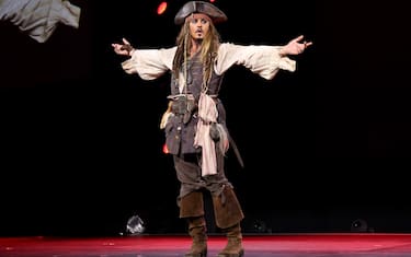 ANAHEIM, CA - AUGUST 15:  Actor Johnny Depp,  dressed as Captain Jack Sparrow, of PIRATES OF THE CARIBBEAN: DEAD MEN TELL NO TALES took part today in "Worlds, Galaxies, and Universes: Live Action at The Walt Disney Studios" presentation at Disney's D23 EXPO 2015 in Anaheim, Calif.  (Photo by Jesse Grant/Getty Images for Disney)