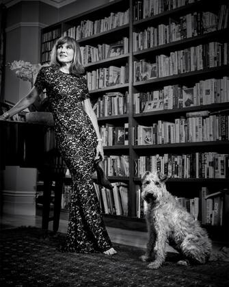 Fiona Bruce with Irish Terrier Molly. See SWNS story SWBRdogs. Celebrity portrait photographer Andy Gotts has created a series of stunning images of the UK's most famous faces - and their dogs. The world-renowned photographer has teamed up with Guide Dogs and its A-list supporters to shine a light on the stars’ most loyal fans. Simon Cowell, David Walliams, Tilda Swinton and Fiona Bruce were among the celebs who posed with their pooches to celebrate the charity’s 90th anniversary and help launch the 2021 Guide Dogs Appeal to fund life-changing services for people with sight loss. David Walliams, who was photographed with border terriers Bert and Ernie, said: “Guide Dogs is such an amazing charity and is one of the first charities you hear about as a child. 