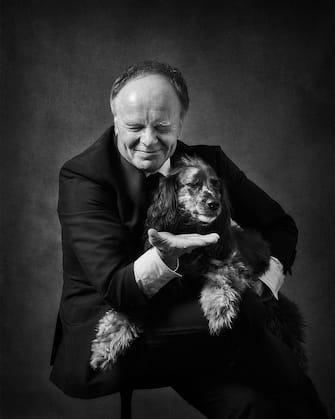 Jason Watkins with Georgie. See SWNS story SWBRdogs. Celebrity portrait photographer Andy Gotts has created a series of stunning images of the UK's most famous faces - and their dogs. The world-renowned photographer has teamed up with Guide Dogs and its A-list supporters to shine a light on the stars’ most loyal fans. Simon Cowell, David Walliams, Tilda Swinton and Fiona Bruce were among the celebs who posed with their pooches to celebrate the charity’s 90th anniversary and help launch the 2021 Guide Dogs Appeal to fund life-changing services for people with sight loss. David Walliams, who was photographed with border terriers Bert and Ernie, said: “Guide Dogs is such an amazing charity and is one of the first charities you hear about as a child. 