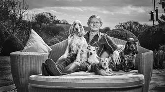 Martin Clunes with Bob Jackson, a Cocker Spaniel; Jim, Parson’s Jack Russell; Penny, Jackahuahua and Heidi, a Cocker Spaniel and Bob Jackson’s mum. See SWNS story SWBRdogs. Celebrity portrait photographer Andy Gotts has created a series of stunning images of the UK's most famous faces - and their dogs. The world-renowned photographer has teamed up with Guide Dogs and its A-list supporters to shine a light on the stars’ most loyal fans. Simon Cowell, David Walliams, Tilda Swinton and Fiona Bruce were among the celebs who posed with their pooches to celebrate the charity’s 90th anniversary and help launch the 2021 Guide Dogs Appeal to fund life-changing services for people with sight loss. David Walliams, who was photographed with border terriers Bert and Ernie, said: “Guide Dogs is such an amazing charity and is one of the first charities you hear about as a child. 