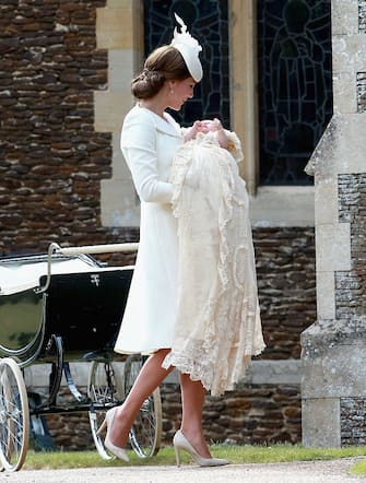 KING'S LYNN, ENGLAND - JULY 05:  Catherine, Duchess of Cambridge and Princess Charlotte of Cambridge arrive at the Church of St Mary Magdalene on the Sandringham Estate for the Christening of Princess Charlotte of Cambridge on July 5, 2015 in King's Lynn, England.  (Photo by Chris Jackson - WPA Pool/Getty Images)