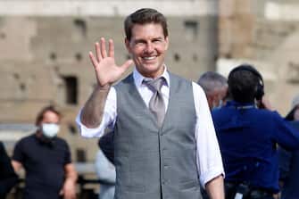 Actor Tom Cruise smiling and waving to his fans  on the set of the film Mission Impossible 7 at Imperial Fora in Rome. Rome (Italy), October 12th 2020 (Photo by Samantha Zucchi/Insidefoto/Mondadori Portfolio via Getty Images)