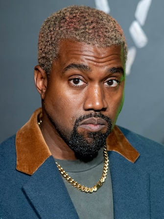 NEW YORK, NEW YORK - DECEMBER 02: Kanye West attends the the Versace fall 2019 fashion show at the American Stock Exchange Building in lower Manhattan on December 02, 2018 in New York City. (Photo by Roy Rochlin/Getty Images)