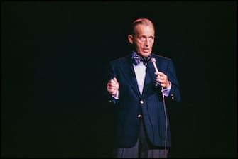 American entertainer Bing Crosby (born Harry Crosby Jr, 1903 - 1977) performs on stage at the Concord Pavilion, Concord, California, August 16, 1977. The performance, billed as 'Bing Crosby & Friends,' was his last live performance in the United States. (Photo by Janet Fries/Getty Images)