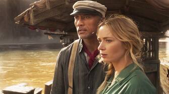 Dwayne Johnson is Frank and Emily Blunt is Lily in Disneyâ€™s JUNGLE CRUISE.