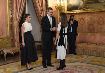 MADRID, SPAIN - DECEMBER 02: King Felipe VI of Spain (C) and Queen Letizia of Spain (L) receive Enviroment minister in Chile and President of COP25, Carolina Schmidt (R) because of the United Nations conference for the Climate Summit 2019 (COP25) at the Royal Palace on December 02, 2019 in Madrid, Spain. (Photo by Carlos Alvarez/Getty Images)