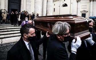 Pallbearers carry the coffin with the mortal remains of late the Italian movie director Lina Wertmueller  at the end of her funeral ceremony at the Artists' Church on the Piazza del Popolo in Rome, Italy, 11 December 2021. Italian director Lina Wertmueller died in Rome at the age of 93 on 09 December 2021. ANSA/ANGELO CARCONI