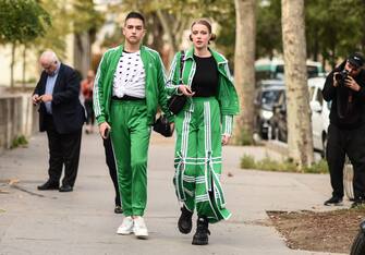 PARIS, FRANCE - SEPTEMBER 28:  Guests are seen wearing matching Adidas outfits outside the Haider Ackermann show during Paris Fashion Week SS20 on September 28, 2019 in Paris, France. (Photo by Daniel Zuchnik/Getty Images)