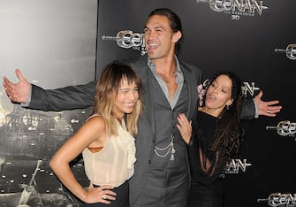 LOS ANGELES, CA - AUGUST 11:  (L-R) Zoe Kravitz, Jason Momoa, and Lisa Bonet attend the world premiere of 'Conan The Barbarian' held at Regal Cinemas L.A. Live on August 11, 2011 in Los Angeles, California.  (Photo by Jason Merritt/Getty Images)