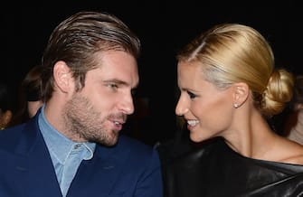 MILAN, ITALY - SEPTEMBER 23:  Tomaso Trussardi and Michelle Hunziker attend the Trussardi Spring/Summer 2013 fashion show as part of Milan Womenswear Fashion Week on September 23, 2012 in Milan, Italy.  (Photo by Venturelli/WireImage)