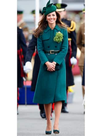 ALDERSHOT, UNITED KINGDOM - MARCH 17: (EMBARGOED FOR PUBLICATION IN UK NEWSPAPERS UNTIL 48 HOURS AFTER CREATE DATE AND TIME) Catherine, Duchess of Cambridge attends the St Patrick's Day Parade at Mons Barracks on March 17, 2014 in Aldershot, England.  Catherine, Duchess of Cambridge and Prince William, Duke of Cambridge visited the 1st Battalion Irish Guards to present the traditional sprigs of Shamrocks to the Officers and Guardsmen of the Regiment.  (Photo by Max Mumby / Indigo / Getty Images)