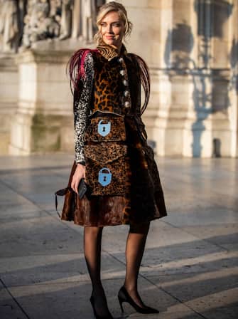 PARIS, FRANCE - JANUARY 21: Chiara Ferragni, wearing a leopard print decorated fur coat and black heels, is seen outside Schiaparelli during Paris Fashion Week - Haute Couture Spring Summer 2019 on January 21, 2019 in Paris, France. (Photo by Claudio Lavenia/Getty Images)