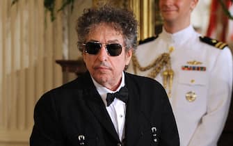 File phoo dated May 29, 2012 of President Barack Obama awards the Presidential Medal of Freedom to singer/songwriter Bob Dylan at the White House in Washington, DC, USA. A new lawsuit alleges that Bob Dylan, the Nobel-winning folk singer-songwriter, plied a 12-year-old girl with drugs and alcohol before sexually abusing her in 1965. Photo by Olivier Douliery/ABACAPRESS.COM