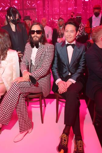 MILAN, ITALY - FEBRUARY 25: Jared Leto and Jungjae Lee are seen at the Gucci show during Milan Fashion Week Fall/Winter 2022/23 on February 25, 2022 in Milan, Italy. (Photo by Victor Boyko/Getty Images for Gucci)