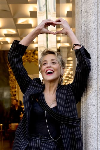 MILAN, ITALY - FEBRUARY 26: Sharon Stone attends a photocall during a Dolce & Gabbana boutique event during the Milan Fashion Week Fall / Winter 2022/2023 on February 26, 2022 in Milan, Italy.  (Photo by Andreas Rentz / Getty Images)