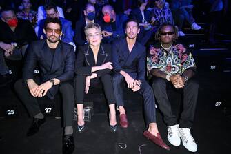MILAN, ITALY - FEBRUARY 26: (L-R) Sam Webb, Sharon Stone, Adam Senn aand Gunna re seen on the front row of the Dolce & Gabbana fashion show during the Milan Fashion Week Fall/Winter 2022/2023 on February 26, 2022 in Milan, Italy. (Photo by Daniele Venturelli/WireImage)