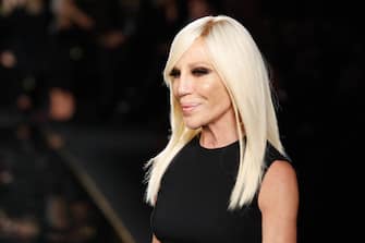 NEW YORK, NEW YORK - DECEMBER 02: Donatella Versace walks the runway at the Versace Pre-Fall 2019 Collection at The American Stock Exchange on December 02, 2018 in New York City. (Photo by JP Yim/Getty Images)