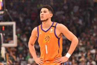 MILWAUKEE, WI - JULY 20: Devin Booker #1 of the Phoenix Suns looks on during Game Six of the 2021 NBA Finals on July 20, 2021 at Fiserv Forum in Milwaukee, Wisconsin. NOTE TO USER: User expressly acknowledges and agrees that, by downloading and/or using this Photograph, user is consenting to the terms and conditions of the Getty Images License Agreement. Mandatory Copyright Notice: Copyright 2021 NBAE (Photo by Jesse D. Garrabrant/NBAE via Getty Images)