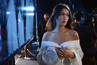 NEW YORK, NY - SEPTEMBER 14:  Model Bella Hadid prepares backstage at Tommy Hilfiger Women's Spring 2016 during New York Fashion Week: The Shows  at Pier 36 on September 14, 2015 in New York City.  (Photo by Grant Lamos IV/Getty Images for Tommy Hilfiger)