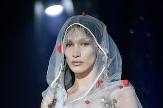 US model Bella Hadid presents a creation for the Vivienne Westwood Fall-Winter 2022-2023 collection fashion show during the Paris Womenswear Fashion Week, in Paris, on March 5, 2022. (Photo by JULIEN DE ROSA / AFP) (Photo by JULIEN DE ROSA/AFP via Getty Images)
