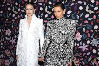 PARIS, FRANCE - FEBRUARY 26: (EDITORIAL USE ONLY) (L to R) Gigi Hadid and Bella Hadid attend the Harper's Bazaar Exhibition as part of the Paris Fashion Week Womenswear Fall/Winter 2020/2021 At Musee Des Arts Decoratifs on February 26, 2020 in Paris, France. (Photo by Pascal Le Segretain/Getty Images)