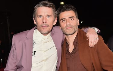 LOS ANGELES, CALIFORNIA - MARCH 22: (L-R) Ethan Hawke and Oscar Isaac attend the Moon Knight Los Angeles Special Launch Event at the El Capitan Theatre in Hollywood, California on March 22, 2022. (Photo by Alberto E. Rodriguez/Getty Images for Disney)