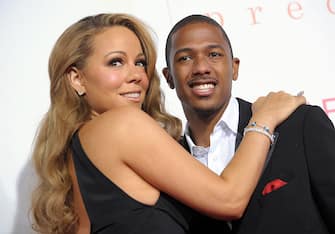 HOLLYWOOD - NOVEMBER 01:  Actress/singer Mariah Carey (L) and actor Nick Cannon arrive at the screening of "Precious: Based On The Novel 'PUSH' By Sapphire" during AFI FEST 2009 held at Grauman's Chinese Theatre on November 1, 2009 in Hollywood, California.  (Photo by Kevin Winter/Getty Images for AFI)