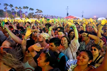 INDIO, CALIFORNIA - APRIL 16: Festivalgoers are seen at the Outdoor Theatre during the 2022 Coachella Valley Music And Arts Festival on April 16, 2022 in Indio, California. (Photo by Frazer Harrison/Getty Images for Coachella)