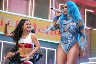 INDIO, CALIFORNIA - APRIL 17: (L-R) Becky G and Karol G perform onstage at the Coachella Stage during the 2022 Coachella Valley Music And Arts Festival on April 17, 2022 in Indio, California. (Photo by Kevin Mazur/Getty Images for Coachella)