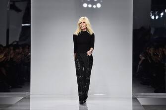 PARIS, FRANCE - JANUARY 24: Donatella Versace walks the runway during the Versace  Spring Summer 2016 show as part of Paris Fashion Week on January 24, 2016 in Paris, France.  (Photo by Pascal Le Segretain/Getty Images)