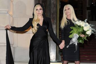 PARIS, FRANCE - JANUARY 19:  Lady Gaga and Donatella Versace attend the Atelier Versace show as part of Paris Fashion Week Haute Couture Spring/Summer 2014 on January 19, 2014 in Paris, France.  (Photo by Jacopo Raule/Getty Images)