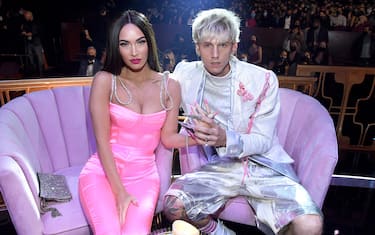LOS ANGELES, CALIFORNIA - MAY 27: (EDITORIAL USE ONLY) (LR) Megan Fox and Machine Gun Kelly attend the 2021 iHeartRadio Music Awards at The Dolby Theater in Los Angeles, California, which was broadcast live on FOX on May 27, 2021. (Photo by Kevin Mazur/Getty Images for iHeartMedia)