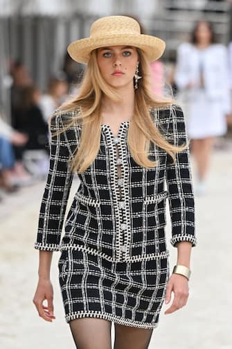 MONTE-CARLO, MONACO - MAY 05: A model walks the runway during the Chanel Cruise 2023 Collection on May 05, 2022 in Monte-Carlo, Monaco. (Photo by Stephane Cardinale - Corbis/Corbis via Getty Images)
