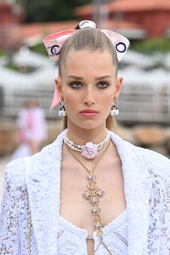MONTE-CARLO, MONACO - MAY 05: A model walks the runway during the Chanel Cruise 2023 Collection on May 05, 2022 in Monte-Carlo, Monaco. (Photo by Stephane Cardinale - Corbis/Corbis via Getty Images)