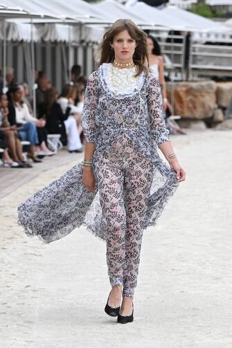 MONTE-CARLO, MONACO - MAY 05: A model walks the runway during the Chanel Cruise 2023 Collection on May 05, 2022 in Monte-Carlo, Monaco.  (Photo by Stephane Cardinale - Corbis / Corbis via Getty Images)