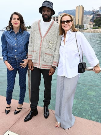 MONTE-CARLO, MONACO - MAY 05: (LR) Charlotte Casiraghi, Abd al Malik and Carole Bouquet attend the Chanel Cruise 2023 Collection on May 05, 2022 in Monte-Carlo, Monaco.  (Photo by Pascal Le segretain / Getty Images)