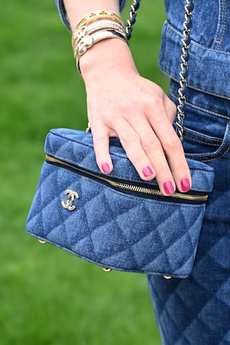 MONTE-CARLO, MONACO - MAY 05: Charlotte Casiraghi, bag detail, attends the Chanel Cruise 2023 Collection on May 05, 2022 in Monte-Carlo, Monaco.  (Photo by Pascal Le segretain / Getty Images)