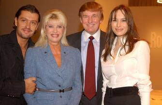 Rossano Rubicondi, Ivana Trump, Donald Trump and Melania Knauss attend the Rosa Cha Runway Show during NYFW on Septempber 19, 2002 in New York City.  (Photo by Fernanda Calfat / Getty Images)